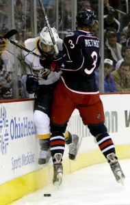 columbus-blue-jackets-marc-methot-right-checks-nashville-predators-michael-santorelli