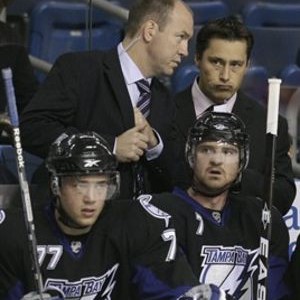 Guy Boucher, right (AP Photo/Chris O'Meara)