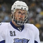 Steven Stamkos with cage and bloody nose: MAY 27 Eastern Conference Final - Lightning at Bruins - Game 7