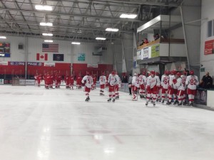 The teams take the ice to start the annual prospect scrimmage game. (Photo: Zackary Landers)