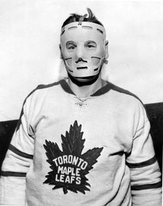 A rare photo of Johnny Bower wearing a mask.
