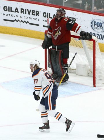 Edmonton Oilers center Connor McDavid and Arizona Coyotes goaltender Adin Hill
