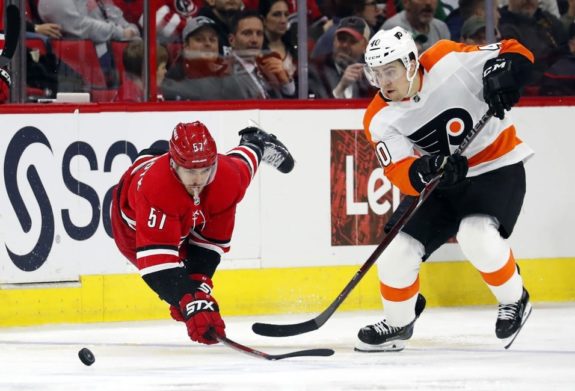 Carolina Hurricanes' Trevor van Riemsdyk Philadelphia Flyers' Jordan Weal