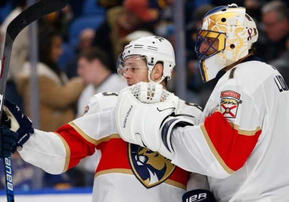 Florida Panthers Evgenii Dadonov and Roberto Luongo