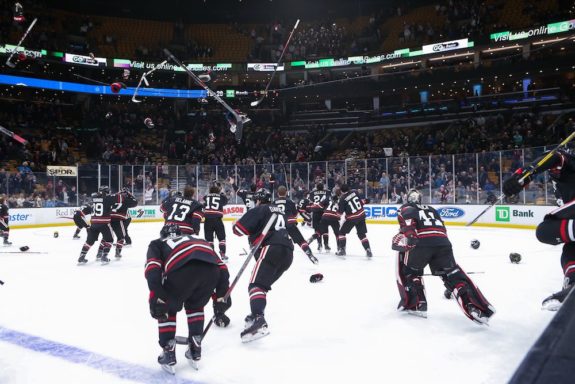 Northeastern celebrating their 2019 Beanpot victory