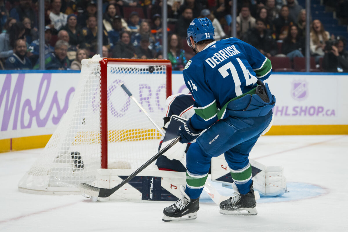 Jake DeBrusk Vancouver Canucks Elvis Merzlikins Columbus Blue Jackets